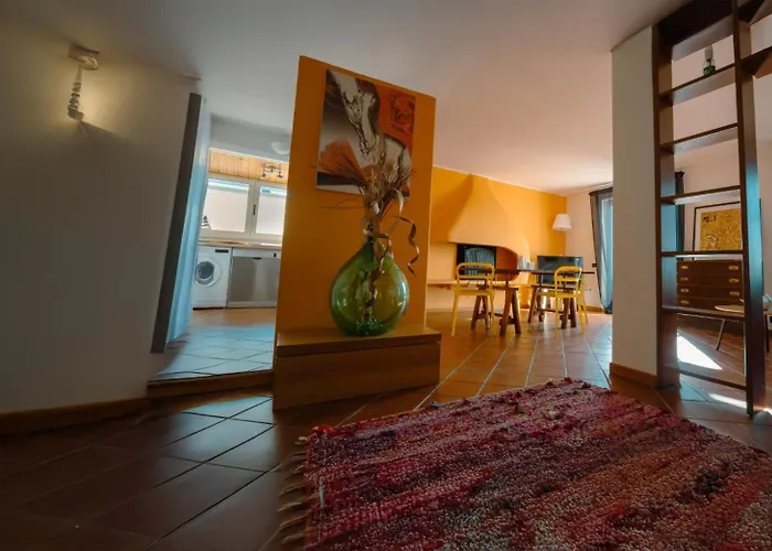 Accogliente Attico Apartmán